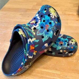 Blue flowered Crocs womens 10, men 8. Like new
